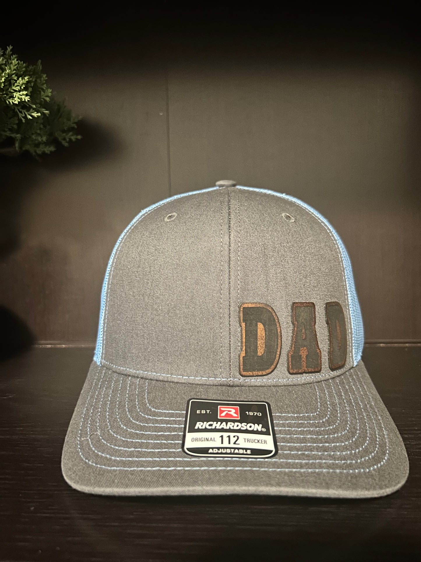 “D A D" custom leather patch on Trucker Hat Charcoal/Columbia Blue