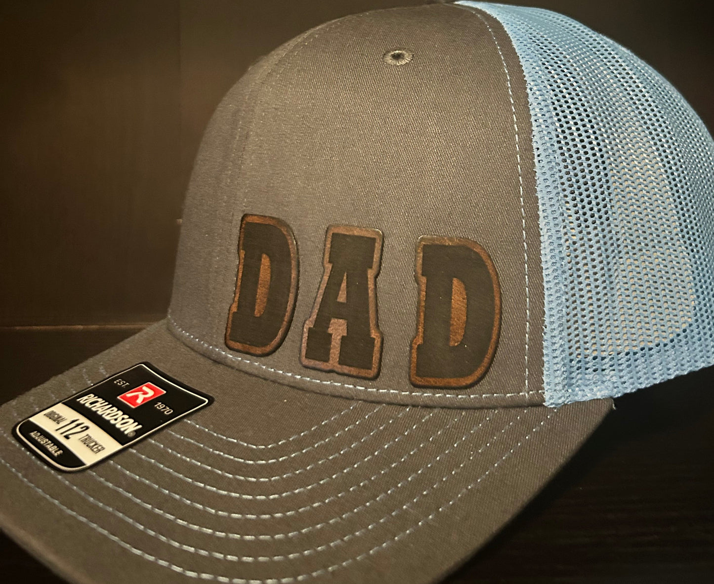 “D A D" custom leather patch on Trucker Hat Charcoal/Columbia Blue
