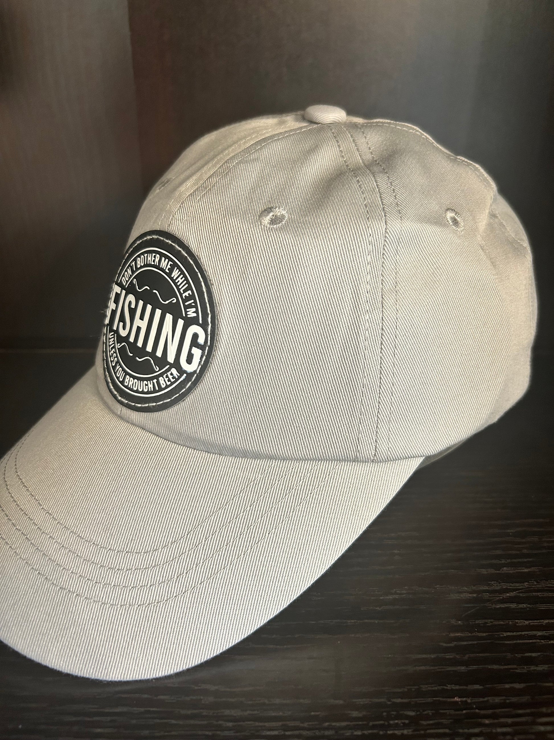 "Don't bother me while I'm FISHING unless you brought a beer" hat.